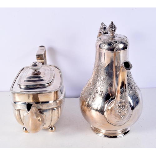 1438H - A LARGE VICTORIAN SILVER AND IVORY COFFEE POT together with an Edwardian silver teapot. London 1861 ... 