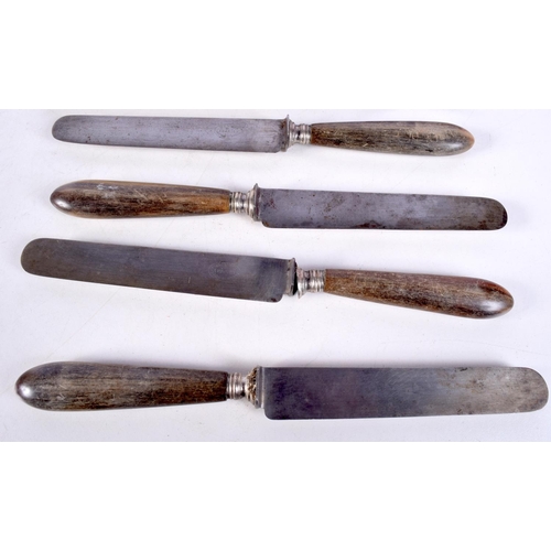 1444 - TWO ANTIQUE RHINOCEROS HORN HANDLED CARVING UTENSILS together with five horn handles knives. Largest... 