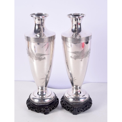 1461 - A PAIR OF LATE 19TH CETJRY JAPANESE MEIJI PERIOD WHITE METAL VASES decorated with birds. Vases 632 g... 