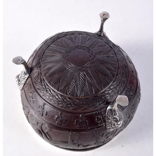 1470 - A RARE 18TH/19TH CENTURY IRISH SILVER MOUNTED COCONUT BOWL decorated with animals and shamrock. 14 c... 