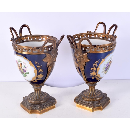 1482 - A PAIR OF 19TH CENTURY FRENCH SEVRES PORCELAIN VASES mounted in bronze. 21 cm x 14 cm.