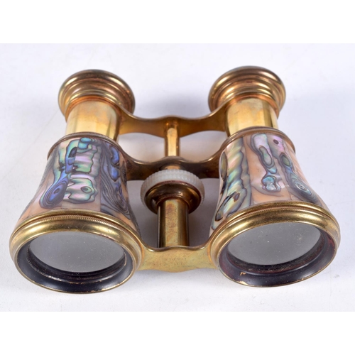 1493 - AN ANTIQUE TREEN PAT and a pair of abalone shell opera glasses. Largest 13 cm x 15 cm. (2)