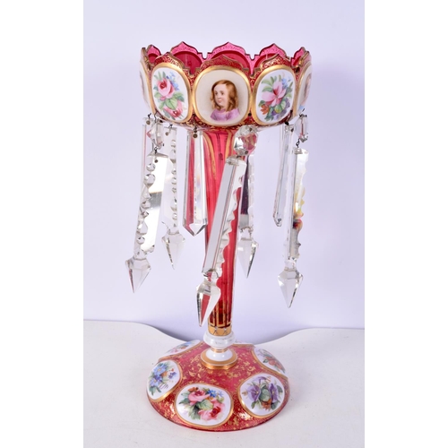 1495D - A LARGE 19TH CENTURY BOHEMIAN ENAMELLED RUBY GLASS LUSTRE painted with portraits. 34 cm high.