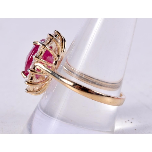 750 - A 9CT GOLD, CZ AND RED GEM RING.  Stamped 9K, Size R, weight 5.7g