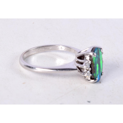 752 - A 14CT WHITE GOLD, DIAMOND AND OPAL RING.  Stamped 475, Size L, weight 3.3g