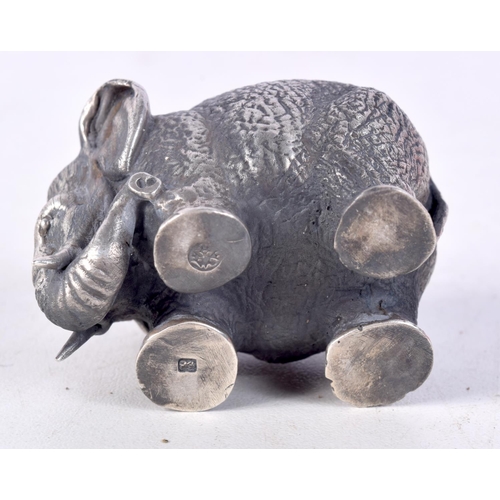 756 - A CONTINENTAL SILVER SALT IN THE FORM OF AN ELEPHANT WITH GILT INTERIOR.  Stamped 84, 3cm x 4.8cm x ... 