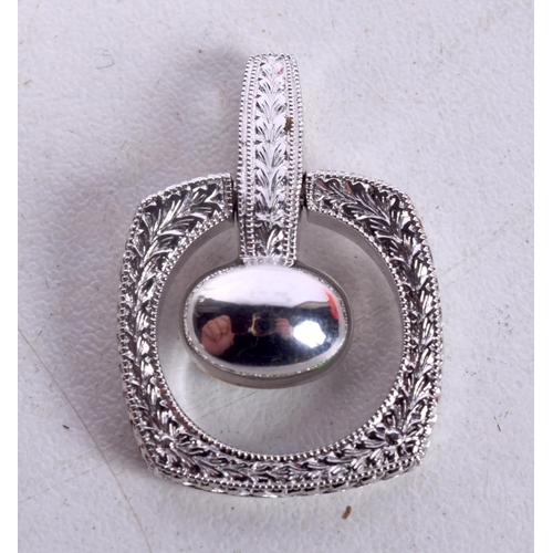 758 - A WHITE METAL AND OPAL PENDANT.  2.8cm x 1.9cm. Weight 8.1g