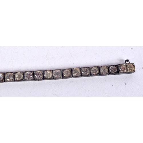 760 - A STERLING SILVER BRACELET SET WITH PASTE GEMS.  Stamped Sterling, 19cm long, weight 20g