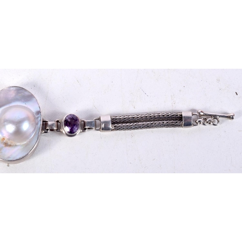 761 - A SILVER BRACELET WITH MOTHER OF PEARL AND GEMS.  Stamped 925, Length 17cm, weight 21.4g