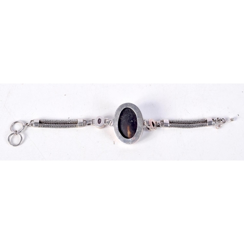 761 - A SILVER BRACELET WITH MOTHER OF PEARL AND GEMS.  Stamped 925, Length 17cm, weight 21.4g