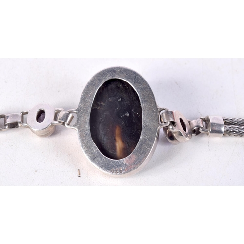 761 - A SILVER BRACELET WITH MOTHER OF PEARL AND GEMS.  Stamped 925, Length 17cm, weight 21.4g