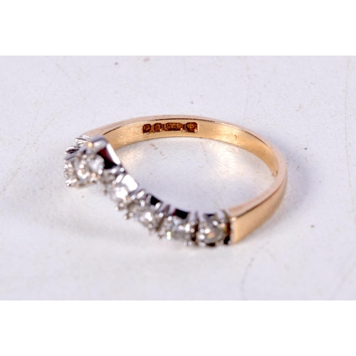 762 - A 9CT GOLD WISHBONE RING SET WITH GEMS.  Stamped 9K, Size N, weight 1.7g