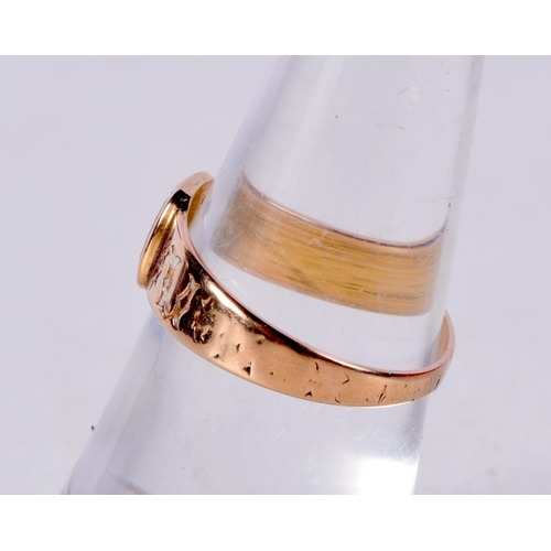 764 - AN 18CT GOLD AND ENAMEL SIGNET RING.  WITH A MONOGRAM 