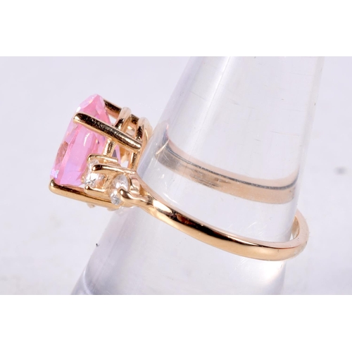 766 - A 14CT GOLD AND GEM SET RING.  Stamped 14K, Size O, weight 4.5g