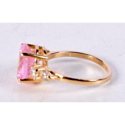 766 - A 14CT GOLD AND GEM SET RING.  Stamped 14K, Size O, weight 4.5g