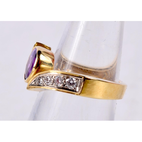 772 - A YELLOW METAL RING SET WITH DIAMONDS AND A PINK GEM.  Size I, weight 5g