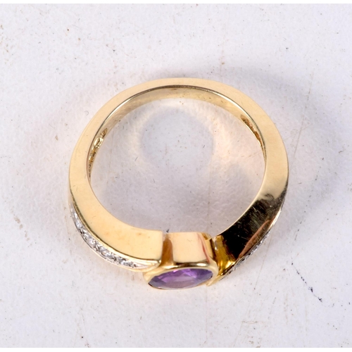 772 - A YELLOW METAL RING SET WITH DIAMONDS AND A PINK GEM.  Size I, weight 5g