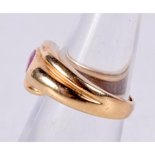 773 - AN 14CT GOLD AND RUBY SNAKE RING.  Stamped 14K, Size I, weight 5.5g