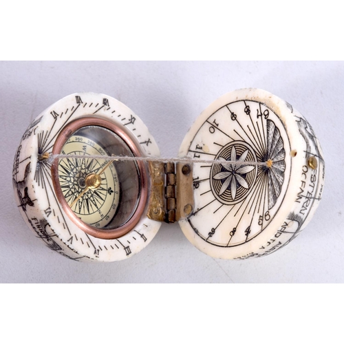 783 - A BONE GLOBE COMPASS.  4cm diameter