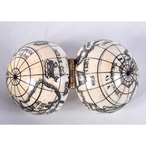 783 - A BONE GLOBE COMPASS.  4cm diameter