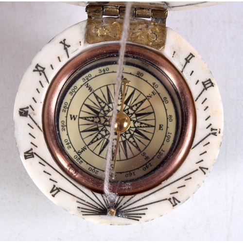 783 - A BONE GLOBE COMPASS.  4cm diameter