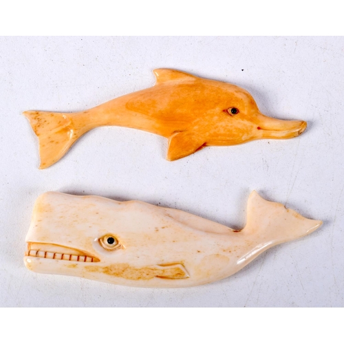 786 - TWO CARVED BONE ANIMALS, A WHALE AND A DOLPHIN.  Largest 8.1cm x 2.3cm x 0.6cm (2)