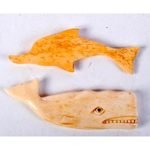 786 - TWO CARVED BONE ANIMALS, A WHALE AND A DOLPHIN.  Largest 8.1cm x 2.3cm x 0.6cm (2)