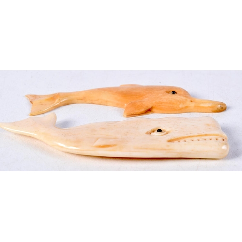 786 - TWO CARVED BONE ANIMALS, A WHALE AND A DOLPHIN.  Largest 8.1cm x 2.3cm x 0.6cm (2)