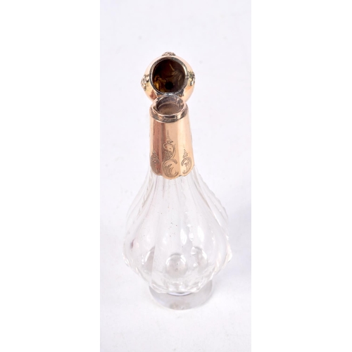 789 - AN 18CT GOLD TOPPED SCENT BOTTLE.  Indistinguishable marks, 11cm x 3.6cm