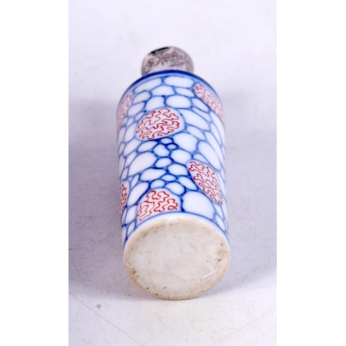 791 - A SILVER TOPPED PORCELAIN SCENT BOTTLE.  8.9cm x 2.8cm