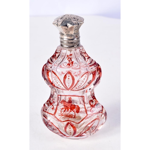 798 - A RUBY GLASS ETCHED SCENT BOTTLE.  10.8cm x 6cm x 3.6cm