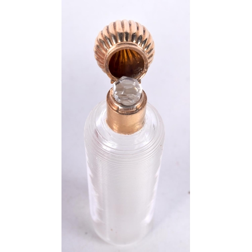 804 - AN 18CT GOLD TOPPED SCENT BOTTLE.  Indistinguishable marks, 9.1cm x 2.4cm