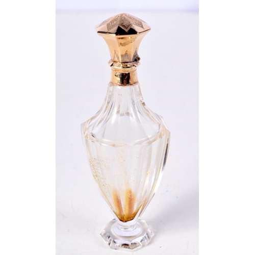 805 - AN 18CT GOLD TOPPED SCENT BOTTLE.  Indistinguishable marks, 10.3cm x 3.6cm