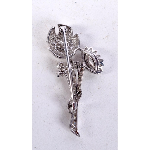 807 - A PLATINUM AND DIAMOND FLOWER BROOCH.  4.4cm x 1.9cm, weight 6.5g