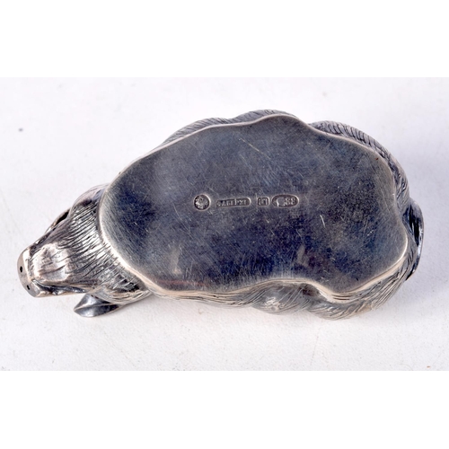 812 - A CONTINENTAL SILVER PIG WITH GEM SET EYES.  Stamped 88, 2.4cm x 6cm x 3.1cm, weight 30.8g