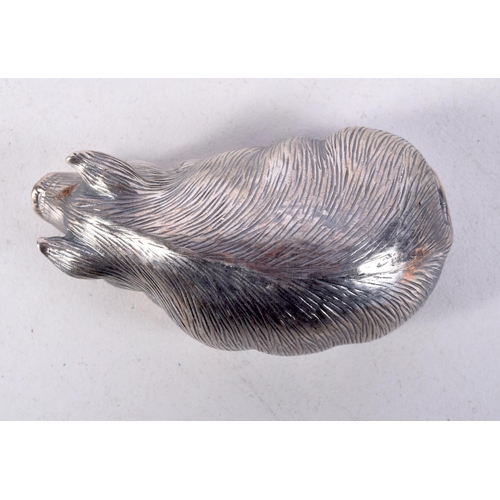 812 - A CONTINENTAL SILVER PIG WITH GEM SET EYES.  Stamped 88, 2.4cm x 6cm x 3.1cm, weight 30.8g