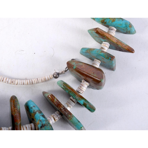 832 - A LARGE TURQUOISE AND BEAD NECKLACE.  90cm long