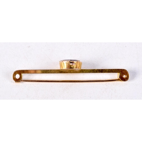 836 - A 9CT GOLD BAR BROOCH SET WITH A GARNET.  Stamped 9K, 4.4cm x 1cm, weight 2.5g