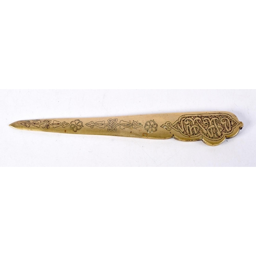 850 - AN ARABIC LETTER OPENER DECORATED WITH RATS AND CALLIGRAPHY  24cm x 3.7cm