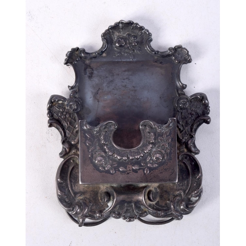 861 - A CONTINENTAL SILVER DESK FRAME.  Stamped Sterling, 8.5cm x 6.8cm, weight 32.4g