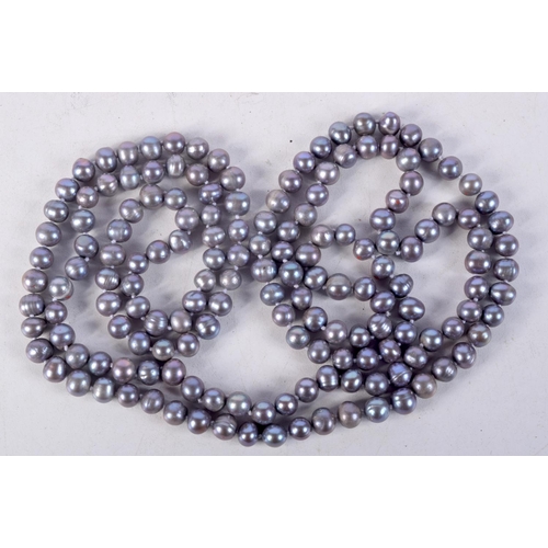 862 - A PEARLESCENT BEAD NECKLACE.  Length 120cm, bead size 7.2mm