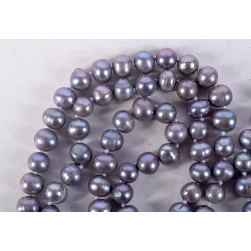 862 - A PEARLESCENT BEAD NECKLACE.  Length 120cm, bead size 7.2mm