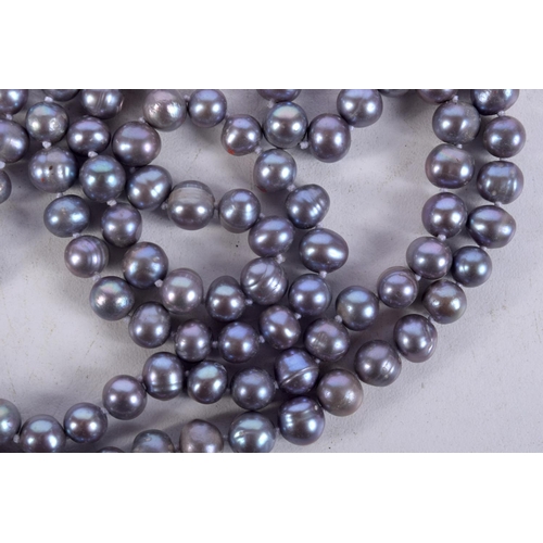 862 - A PEARLESCENT BEAD NECKLACE.  Length 120cm, bead size 7.2mm