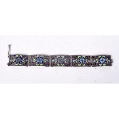 865 - A WHITE METAL AND ENAMEL BRACELET.  23.7cm long, weight 23.7g