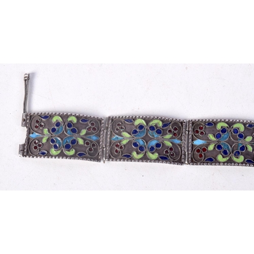 865 - A WHITE METAL AND ENAMEL BRACELET.  23.7cm long, weight 23.7g