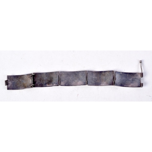 865 - A WHITE METAL AND ENAMEL BRACELET.  23.7cm long, weight 23.7g