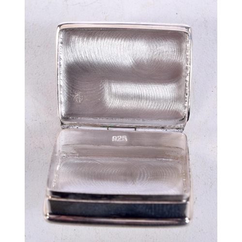 873 - A CONTINENTAL SILVER PILL BOX DECORATED WITH A NUDE FEMALE.  Stamped 925, 1.3cm x 2.6cm x 3.2cm, wei... 