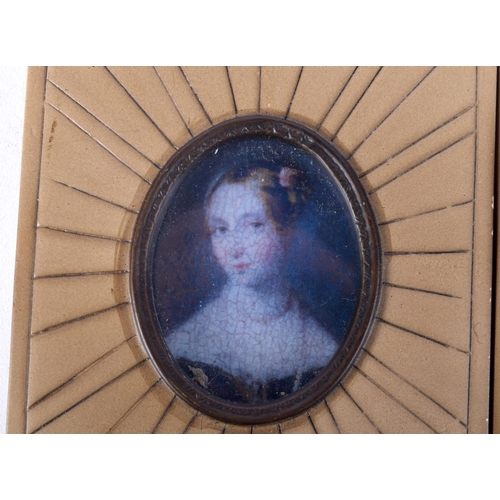 877 - A PAIR OF CONTEMPORARY PORTRAIT MINIATURES.  9.5cm x 8cm (2)