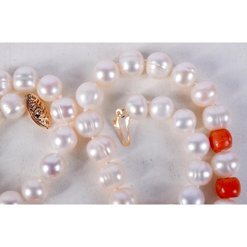 882 - A CORAL AND PEARL NECKLACE WITH A 14CT GOLD CLASP.  Stamped 14K, Length 40cm, Pearl size 6.5mm