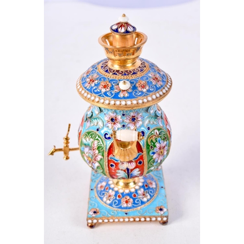 893 - A CONTINENTAL SILVER AND ENAMEL MINIATURE SAMOVAR.  Stamped 84, 10.7cm x 6.1cm, weight 154g